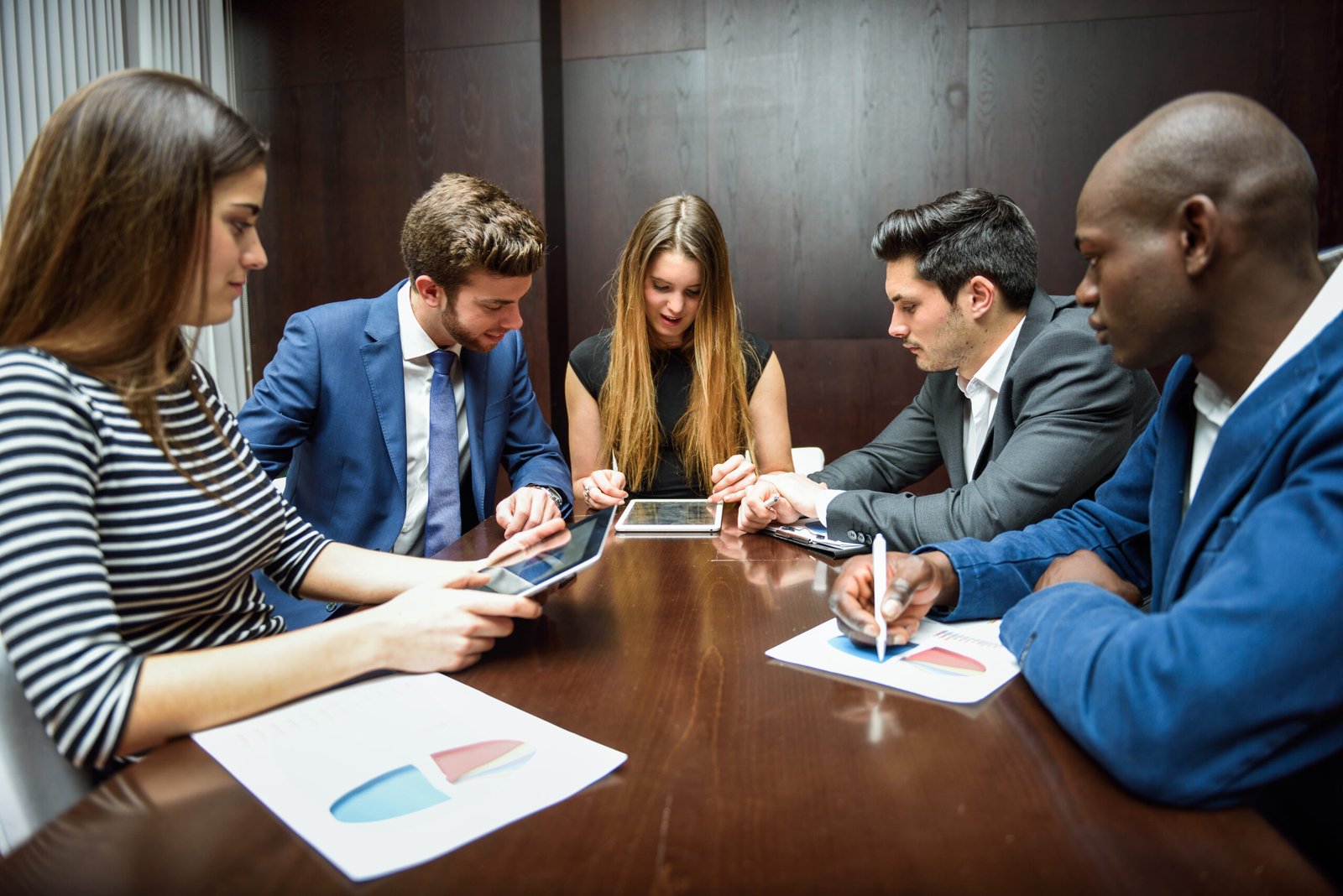 group of multiethnic busy people working in an office