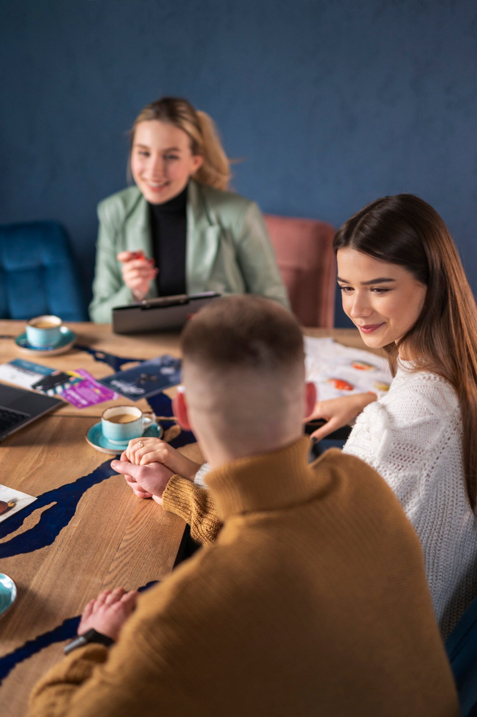 female wedding planner working with couple